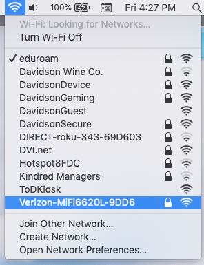 The macOS wireless dropdown menu with the hotspot network selected.