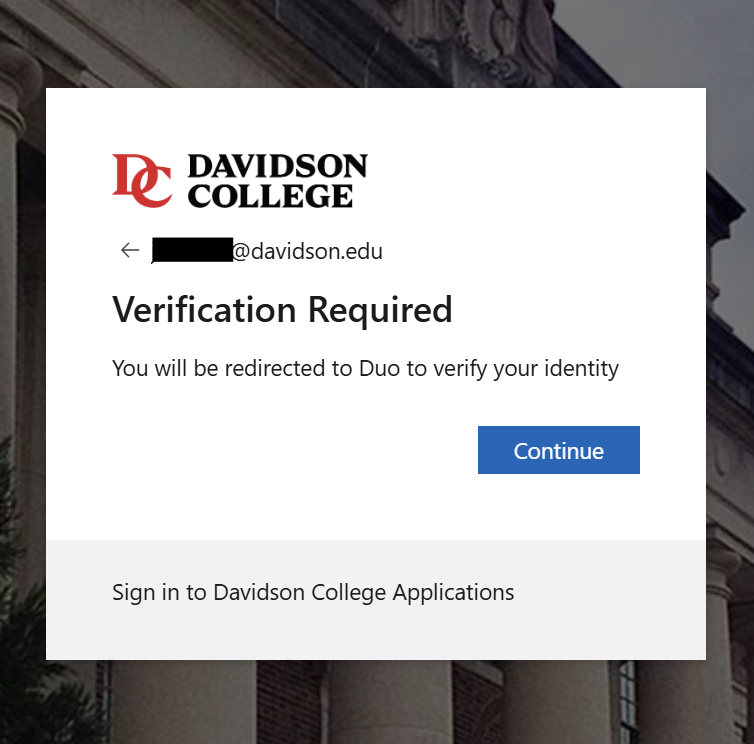 Davidson College verification prompt displaying the college logo at the top left, followed by a back arrow and a redacted email address ending in "@davidson.edu". Below, the heading "Verification Required" appears above the text "You will be redirected to Duo to verify your identity", accompanied by a blue "Continue" button on the right and a grey banner at the bottom reading "Sign in to Davidson College Applications".